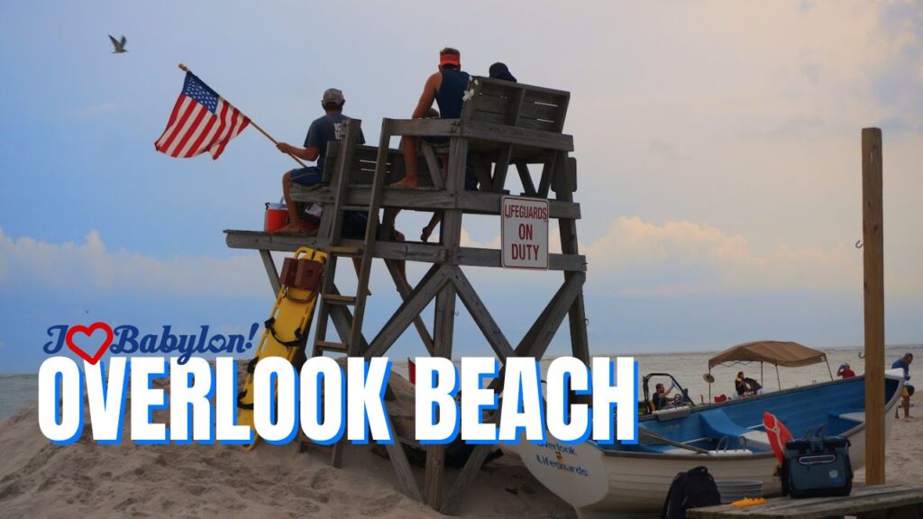 Lifeguards keep watch over swimmers in the Atlantic Ocean at Overlook Beach